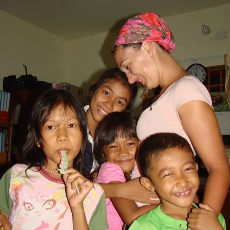 Martina with children in Cambodia